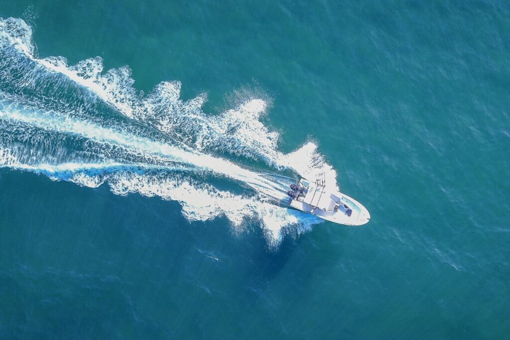 small boat on open sea